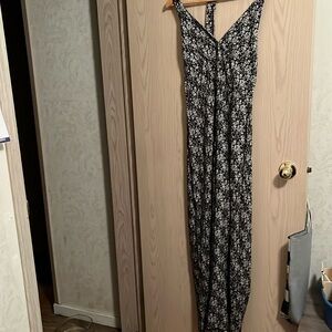 Friend of mine halter jumpsuit. Wide leg pants. Cute white daisy’s size 4